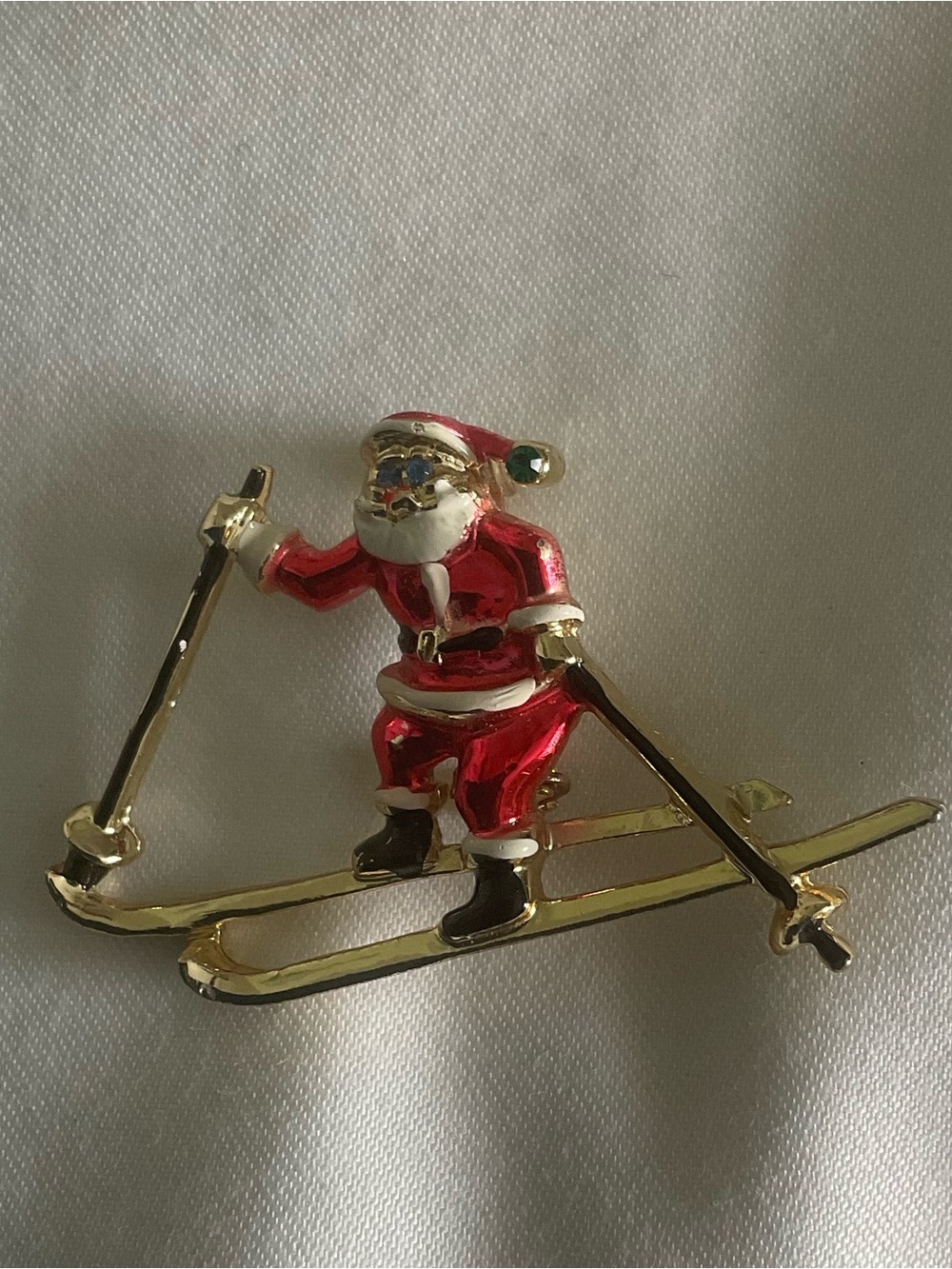 Vintage signed BJ skiing Santa Claus gold tone brooch/pin